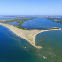 France, Bouches du Rhone (13), Parc Naturel Regional de Camargue, Arles, Salin de Giraud, embouchure du Rhone (vue aerienne)